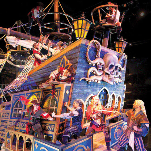 Performers ride a pirate ship in a Myrtle Beach, South Carolina, stage show
