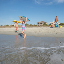 Family boogie boarding in Myrtle Beach, South Carolina