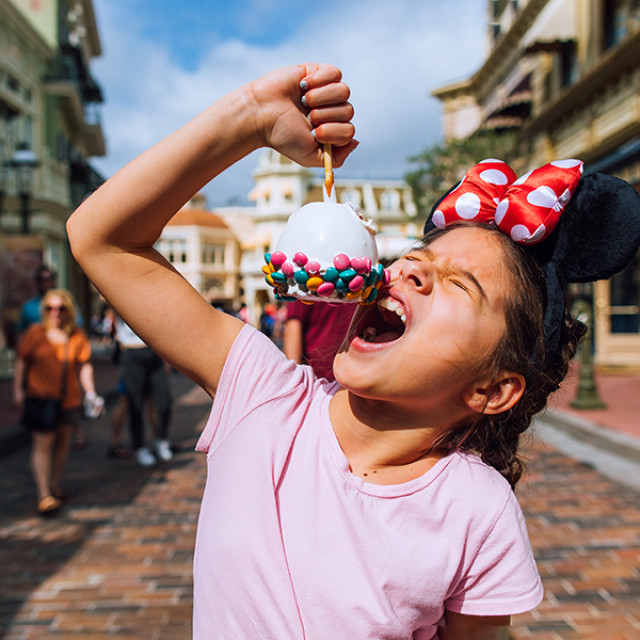 Enjoying a sweet treat at one of Orlando, Florida's many theme parks