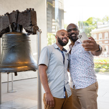 Posing in front of the Liberty Bell in Philadelphia, Pennsylvania