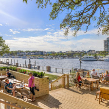Deck dining with waterway views at Big Chill Island House in North Myrtle Beach, South Carolina