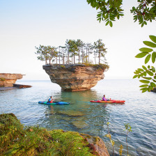 Kayaker and Turnip Rock near Port Austin, Michigan