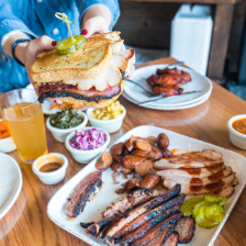 Enjoying barbecue cuisine at Gatlin's BBQ in Houston, Texas